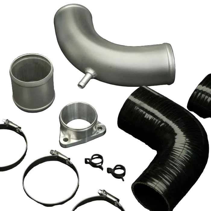 Collection of automotive intake components on a dark surface