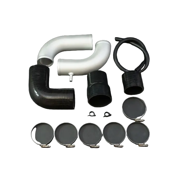 Set of automotive intake pipes and clamps on a dark background