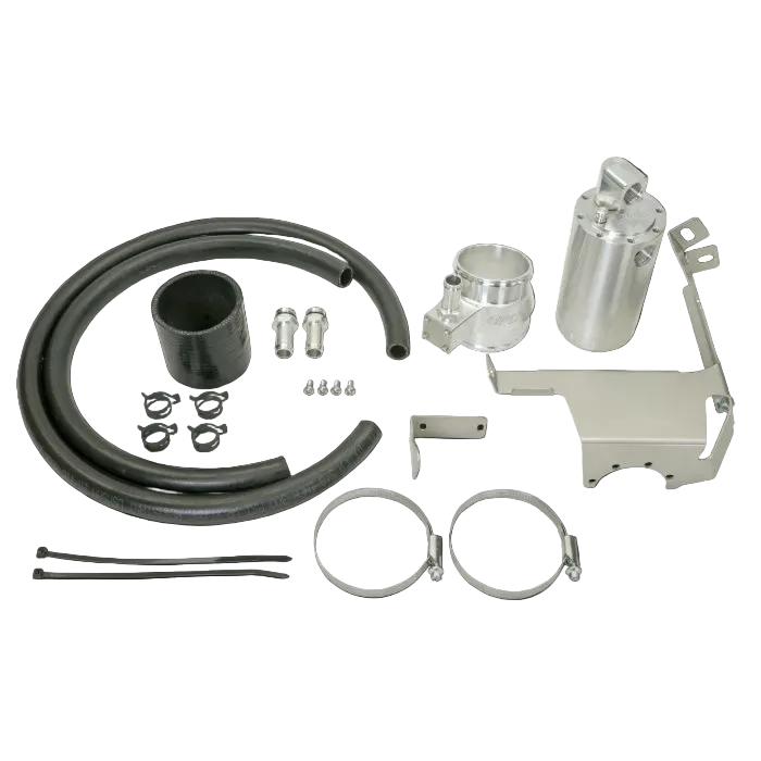 Collection of automotive parts including hoses, connectors, and metal components on a black background