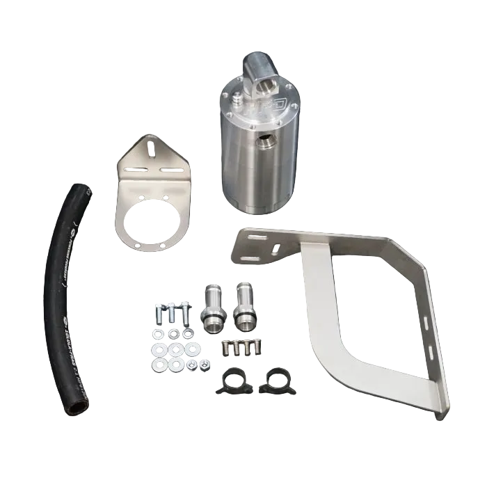 Collection of automotive parts including a metal bracket, hose, and cylindrical component on a dark background.