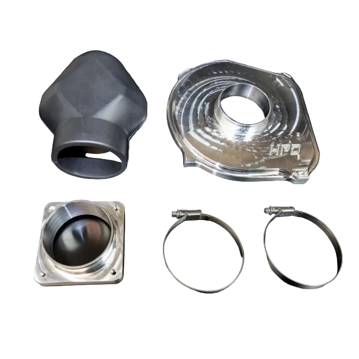 Set of automotive parts including a metal cover, hose clamp, and other components on a black background.