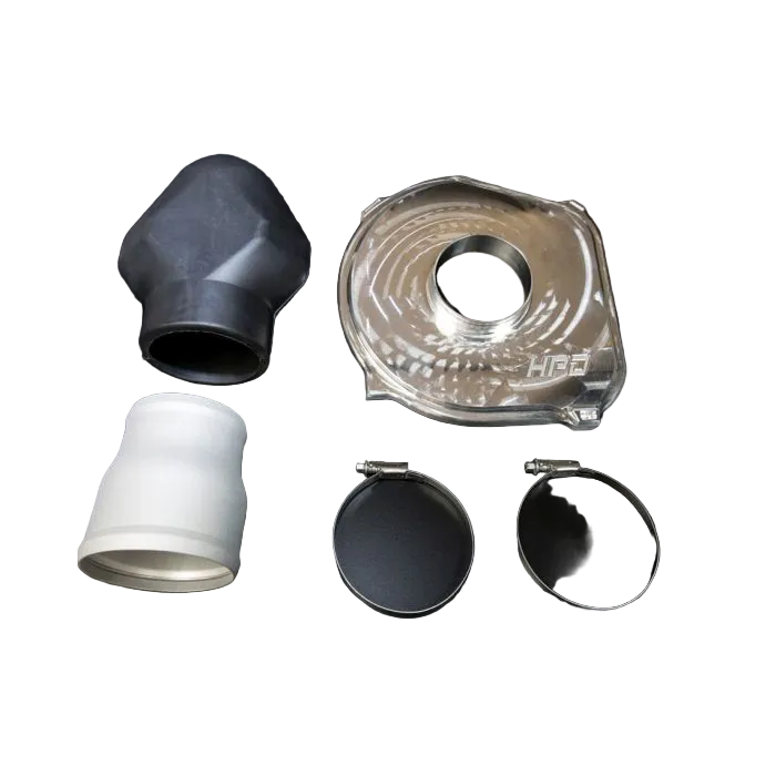 Set of automotive parts including a black rubber boot, white plastic component, clear plastic cover with 'HISE' branding, and metal clamps on a dark background.