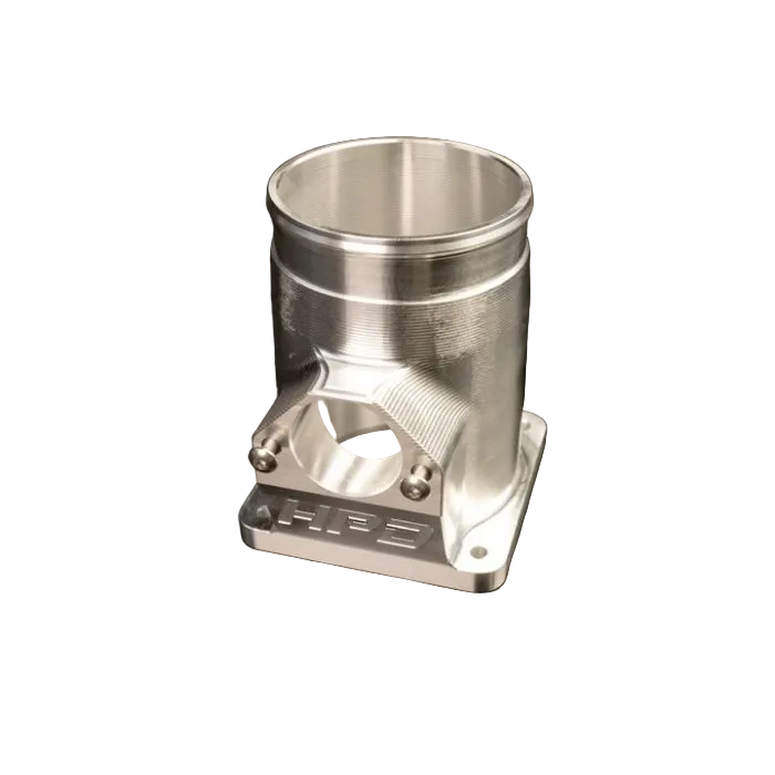 Metallic engine component on a black background