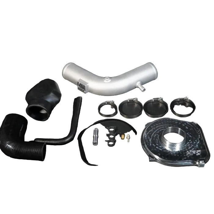 Automotive parts including a metallic elbow pipe, black silicone hose, and various components on a dark background.